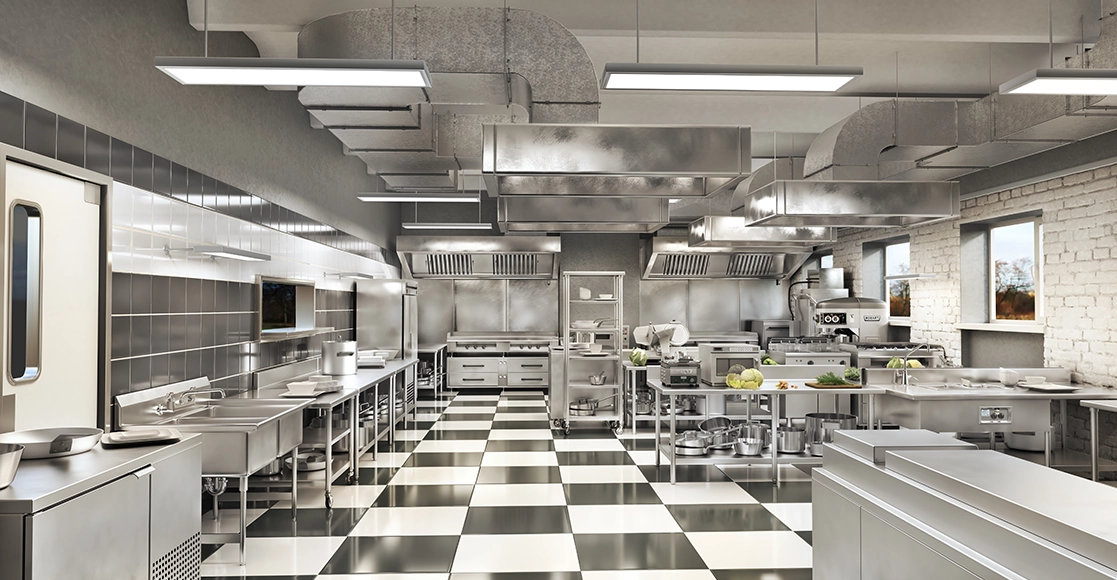 A kitchen with many different types of appliances.